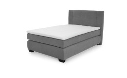 Boxspringbett Felina mit einem Bezug in der Farbe Dunkelgrau und einem weißen Topper
