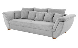 Big-Sofa Chiemsee in einem grauen Cordstoff mit 3 großen und 6 kleinen Kissen.