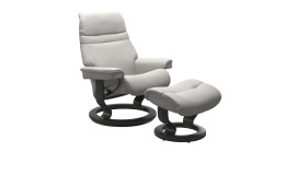 Relaxsessel mit Hocker Stressless Sunrise M Classic in grauem Leder mit grauem Gestell.