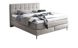 Komfort-Boxspringbett MONDO Barell-Almeria in einem Beigen Stoffbezug.