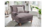 Loveseat-Sessel in der Farbe grau-braun, in einem Raum stehend