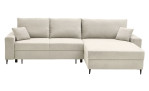 Wohnlandschaft self Justus aus Stoff in der Farbe Creme mit zwei Zierkissen.