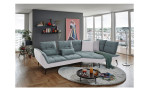 Komfort-Ecksofa vito Ticona, in der Farbausführung Blau-Grau / Silver, in einem Raum stehend mit der Rückenfunktion