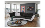 Komfort-Ecksofa vito Ticona, in der Farbausführung Schwarz / Silver, in einem Raum stehend mit der Rückenneigung