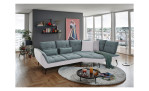 Komfort-Ecksofa vito Ticona, in der Farbausführung Blau-Grau / Silver in einem Raum stehend