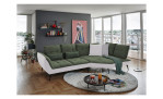 Komfort-Ecksofa vito Ticona, in der Farbausführung Olive / Silver in einem Raum stehend