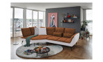 Komfort-Ecksofa vito Ticona, in der Farbausführung Kupfer  / Silver in einem Raum stehend