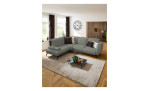 Basis-Ecksofa vito Bevy, in der Farbausführung Stone, in einem Raum stehend, Draufansicht