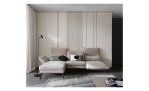 Komfort - Ecksofa Spin, in der Farbausführung taupe, in einem Raum stehend mit der Rückenneigung und der runtergeklappten Armlehne auf der linken Seite