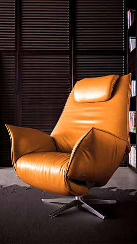 Koinor Einzelsessel Safira mit Anilinleder in der Farbe Sun (Orange)