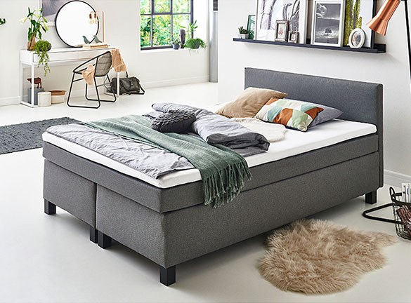 Boxspringbett Peggyim zeitlosen Stil, mit grauem Microfaserbezug